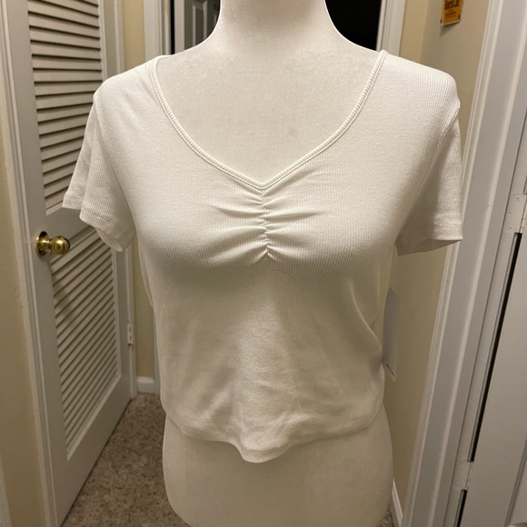 Fred Meyer cute white crop top with lace up back. Size L but fits like M. - Picture 1 of 4